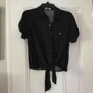 Black and white button up blouse.